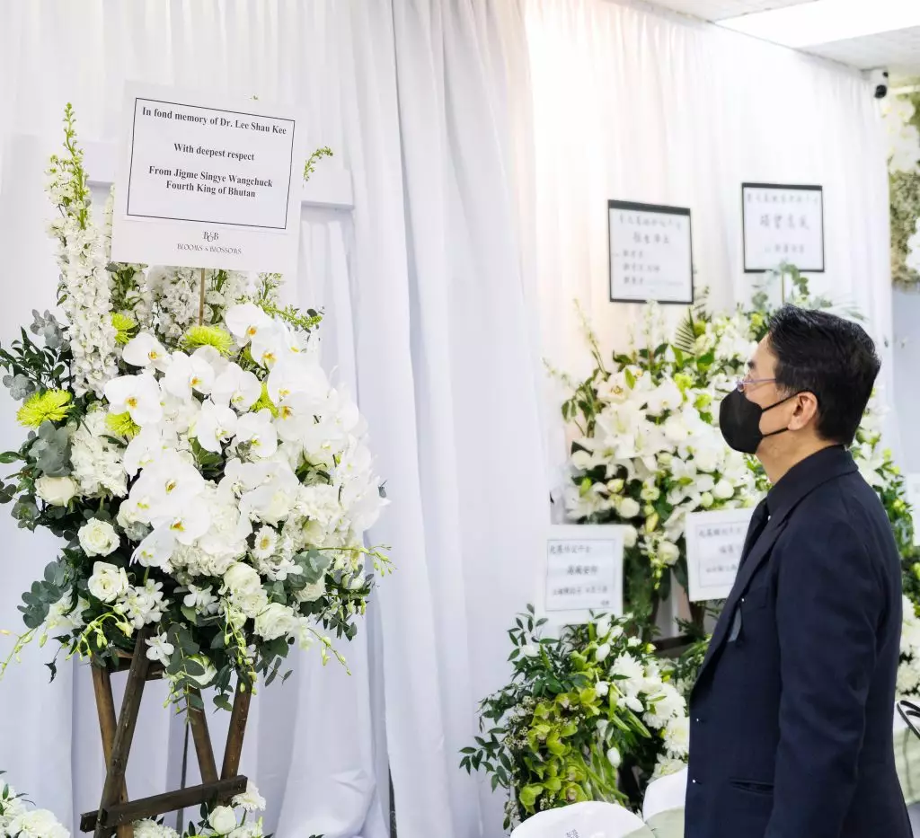 不丹王室致送花牌,李家傑及李家誠代表家族,衷心感謝社會各界人士及傳媒的深切慰問。