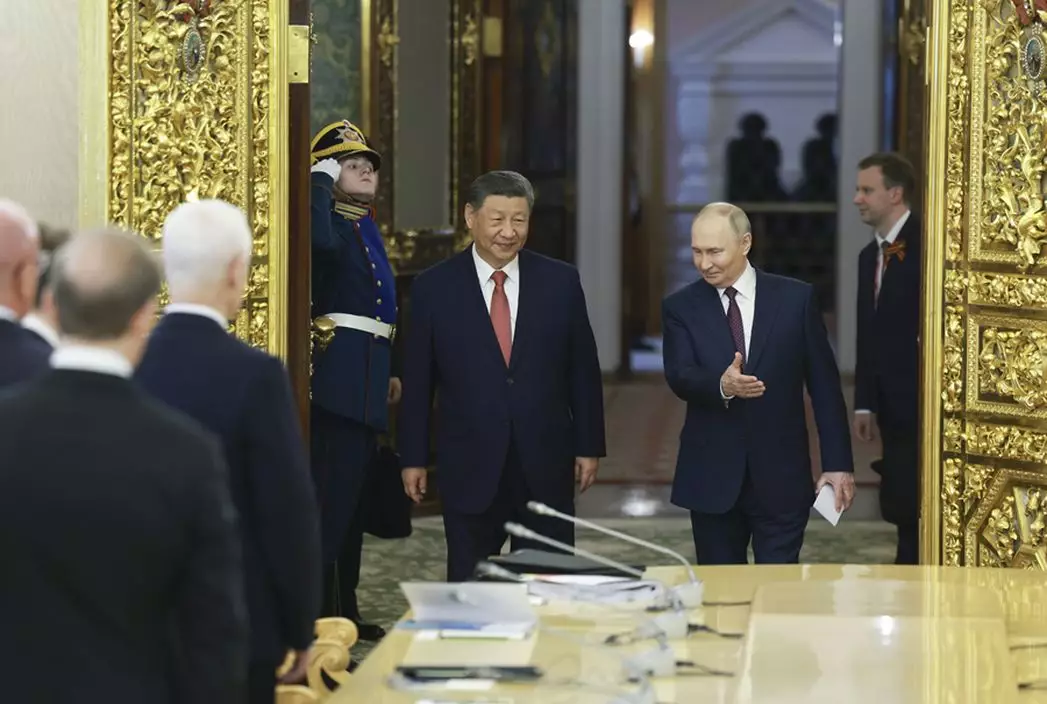 國事訪俄的國家主席習近平,在莫斯科克里姆林宮與俄羅斯總統普京舉行會談。新華社圖片