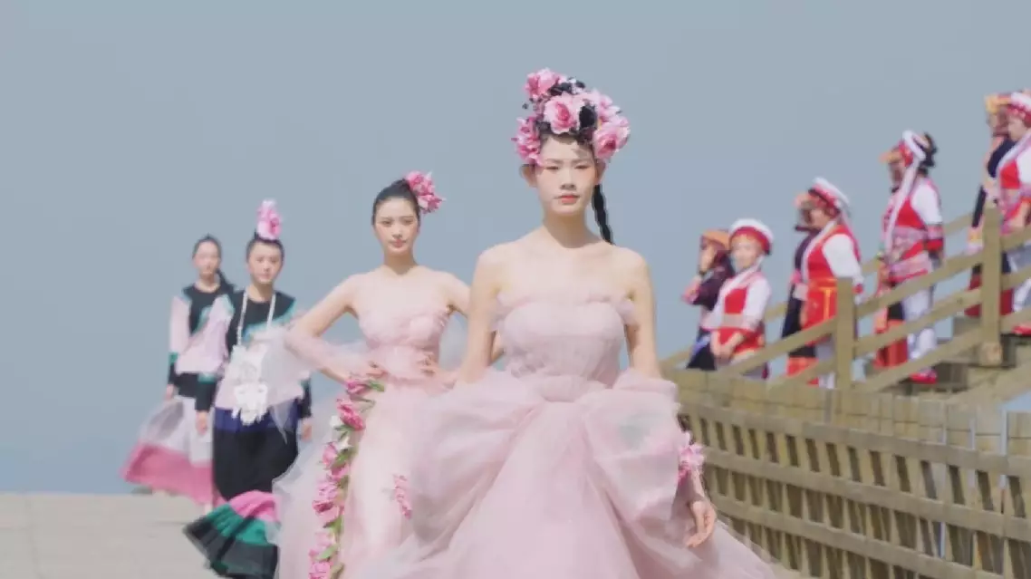 Village fashion show unfolds amidst flower blossom in Guizhou