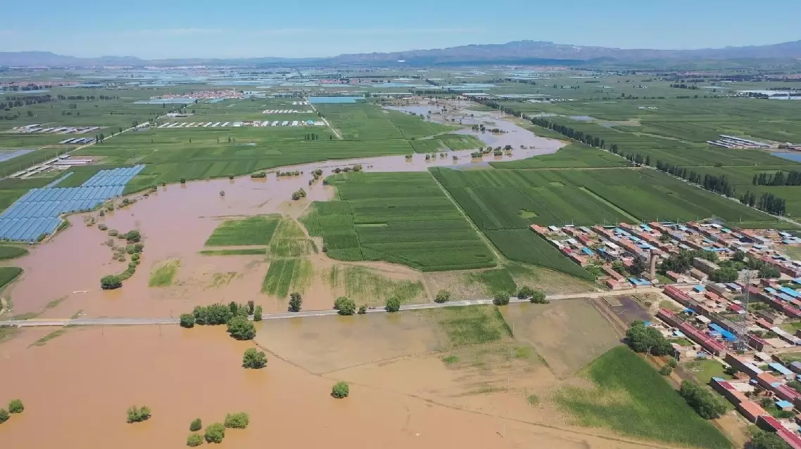 Heavy rain breaks roads, bridges, triggers floods in north China's Shanxi