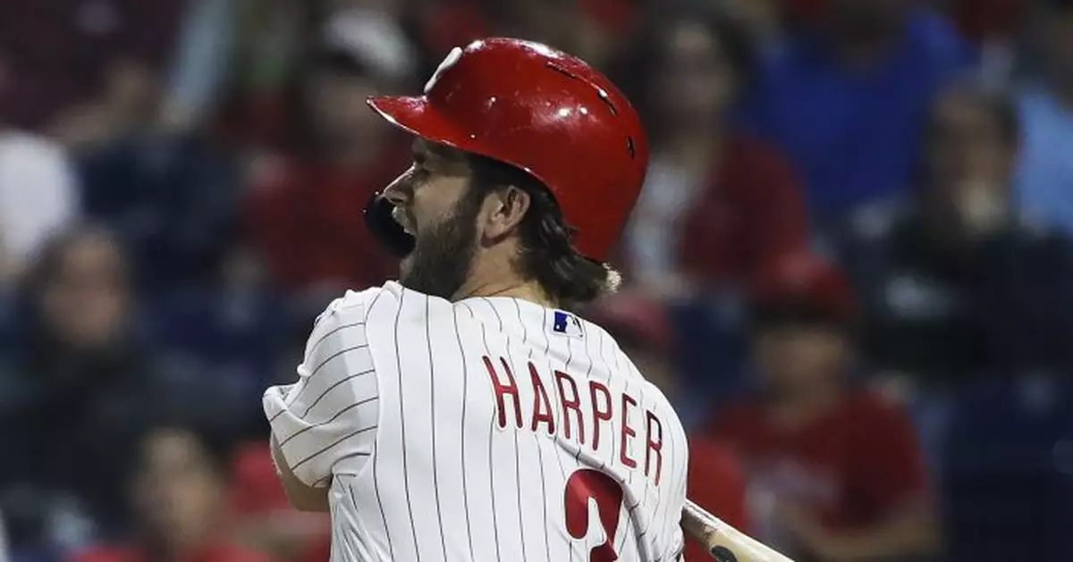 Phillies star Harper leaves game after foul ball off foot