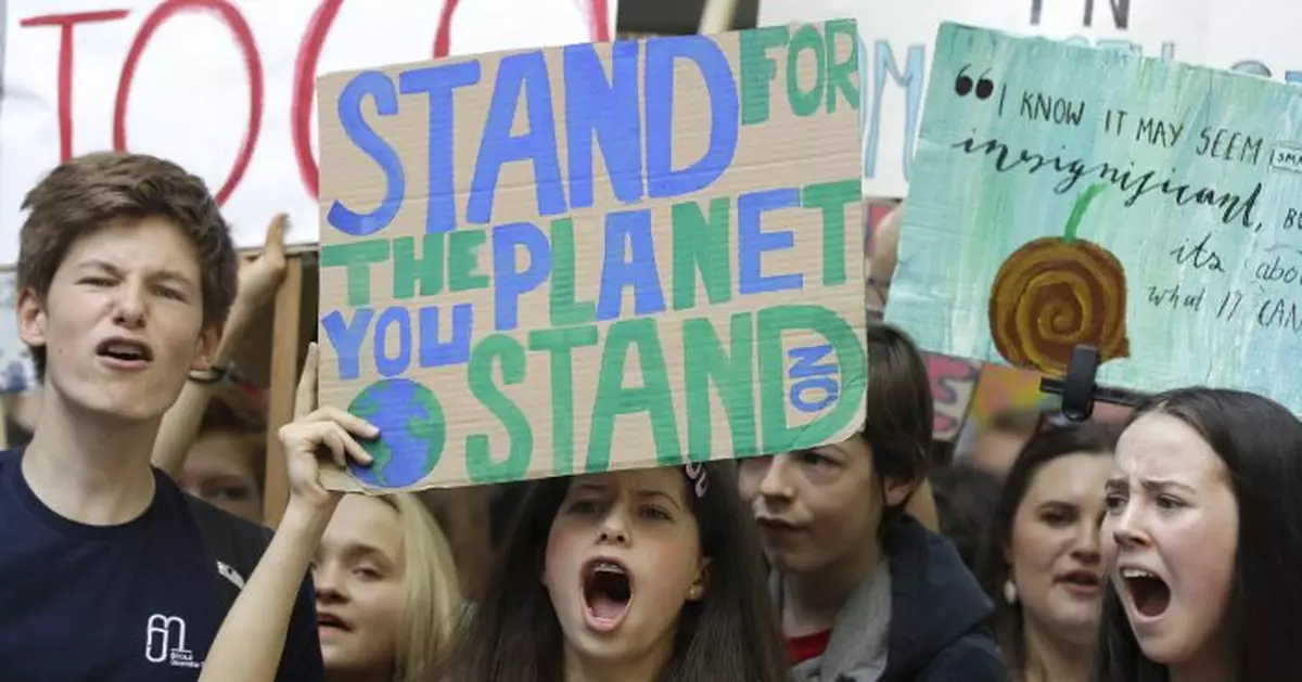 Climate protesters turn out as Europe votes on parliament
