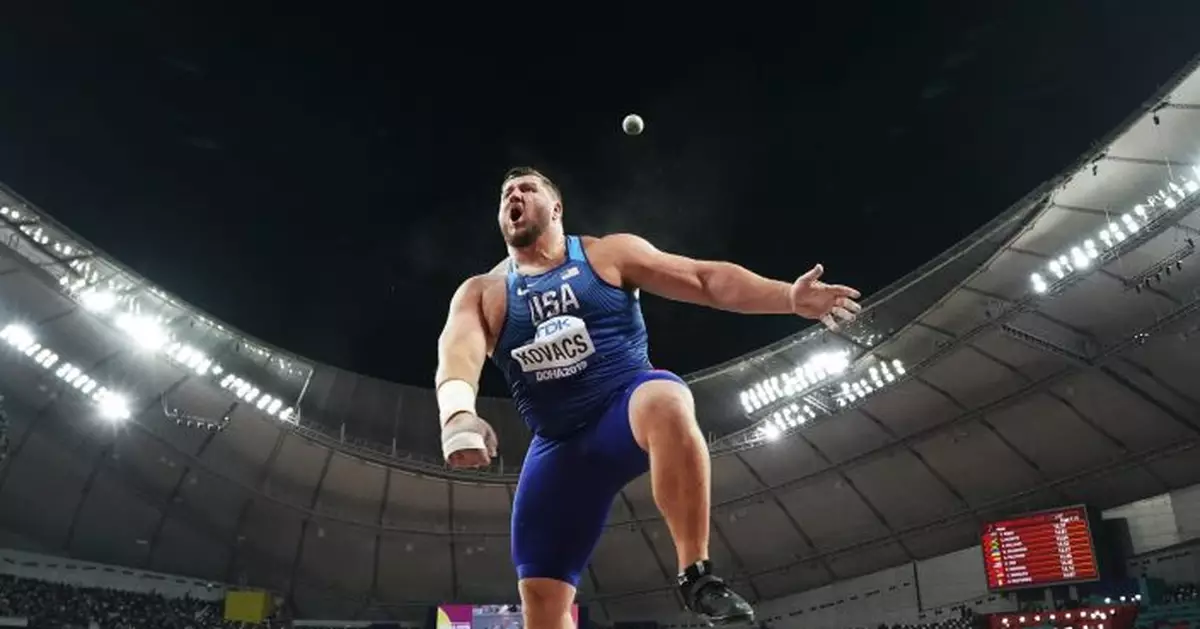 Kovacs wins shot put gold at worlds with wife as coach