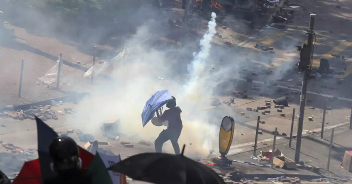 The Latest: Hong Kong extends suspension of school classes