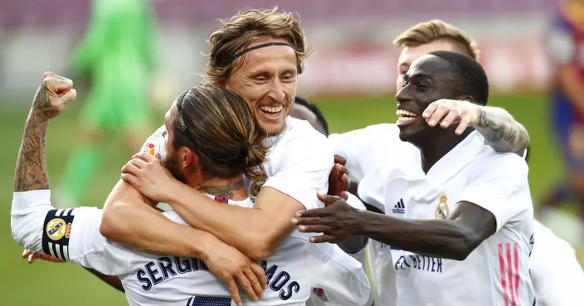 Ramos, VAR help give Madrid 3-1 win at Barcelona