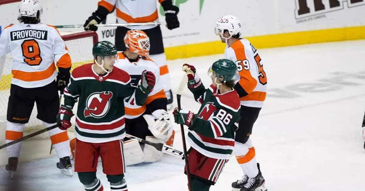 Devils snap 10-game skid in wild, 6-4 win over Flyers