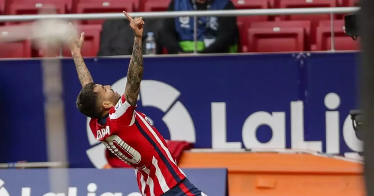 Atlético beats Huesca to return to the top in Spanish league