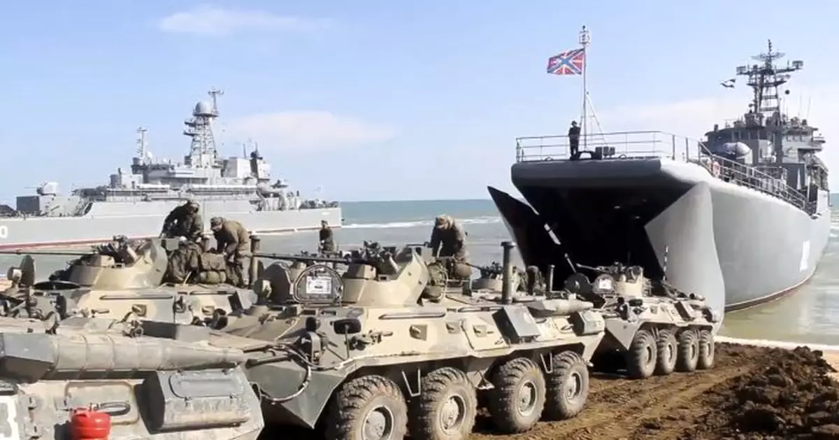 Russian troops start pulling back from Ukrainian border