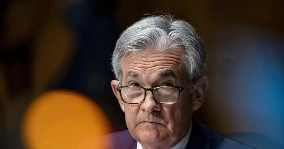 Even as economy heats up, Fed to stick with near-zero rates