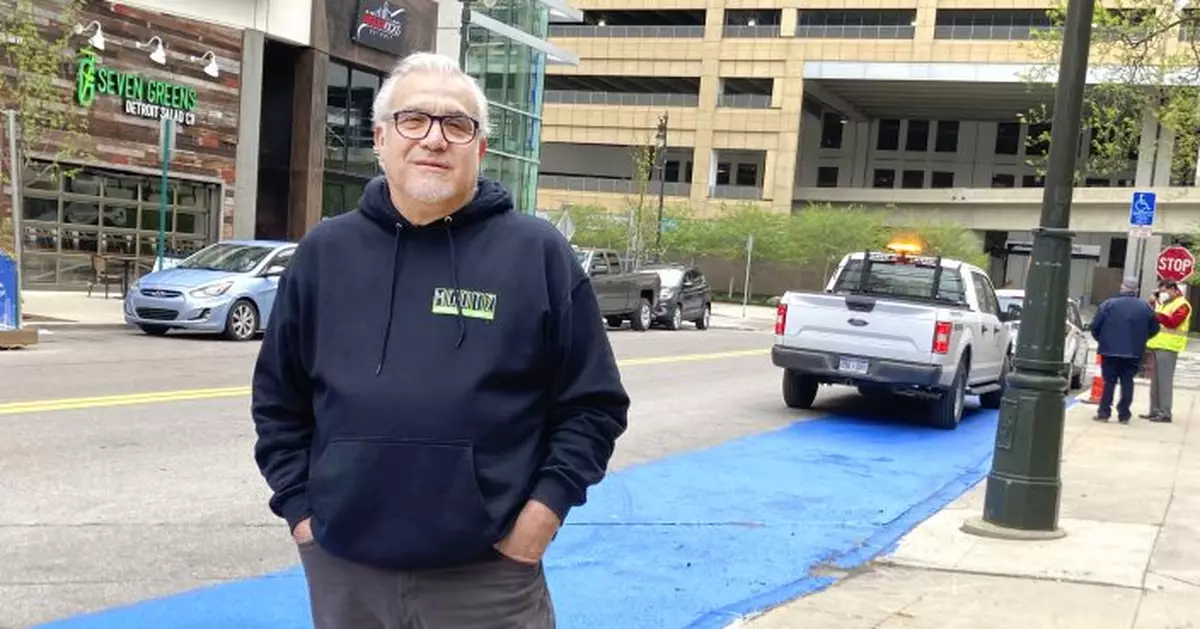 Detroit pizza man paints street, tries to save people dough