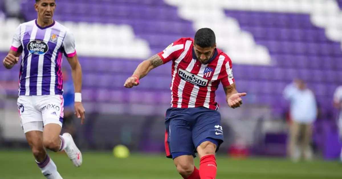 Atlético holds on to win 1st Spanish league title since 2014