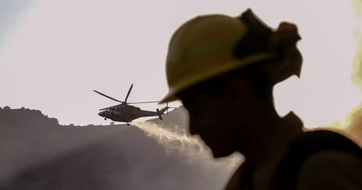 Crews battle Los Angeles wildfire that forced evacuations