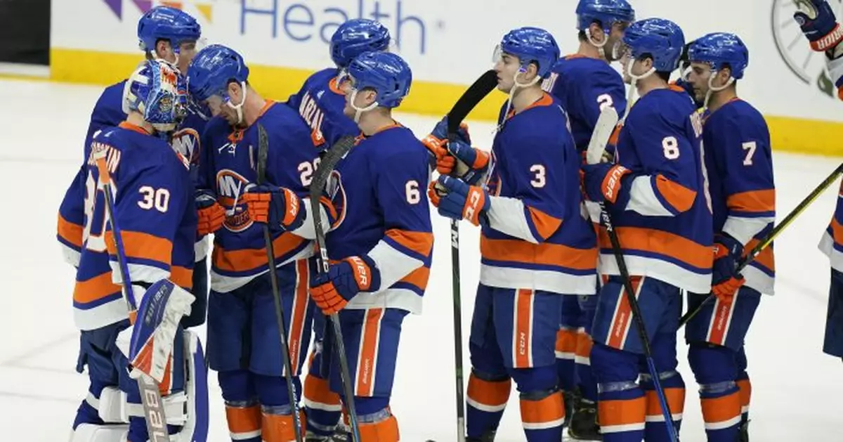 The Latest: Islanders to have fully vaccinated fan section