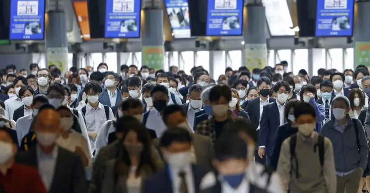 Japan set to extend virus emergency in Tokyo through May 31