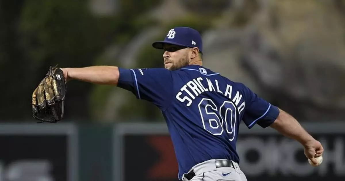 Angels pick up reliever Strickland from Rays