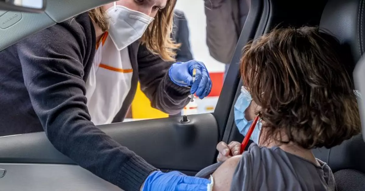 German doctor sets up vaccine center in supermarket lot