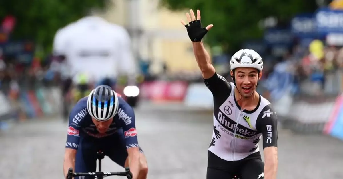 Campenaerts gets 1st Grand Tour stage win, Bernal keeps lead