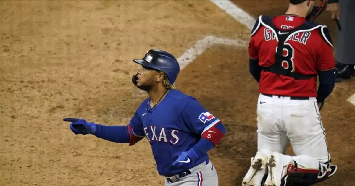 García homers in 10th, Rangers come back to beat Twins 6-3