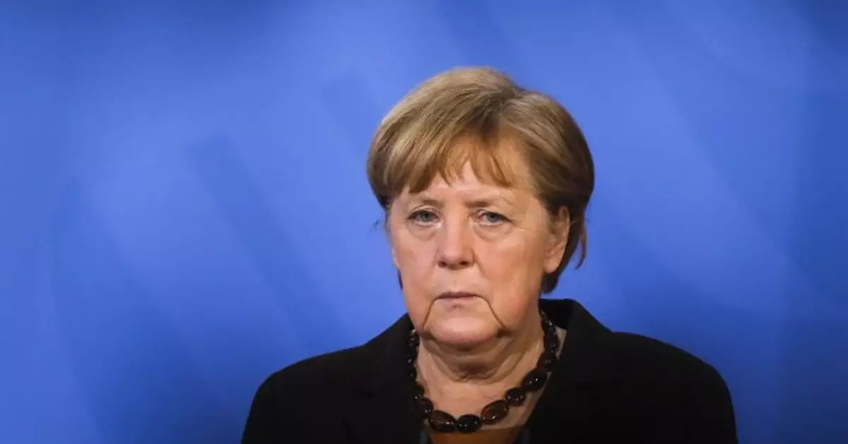 Germany&#039;s Merkel: build political majority vs climate change