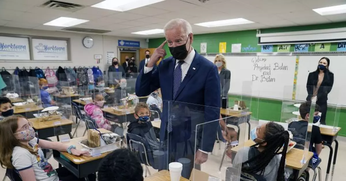 Biden hits schools goal even as many students learn remotely