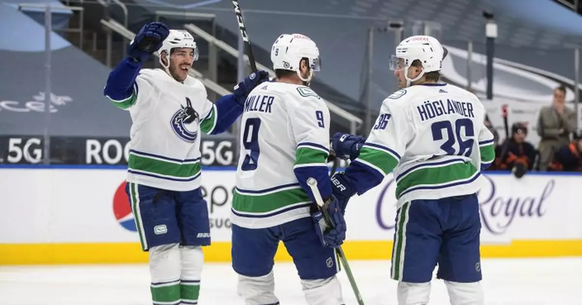Canucks stop 6-game skid with 6-3 victory over Oilers