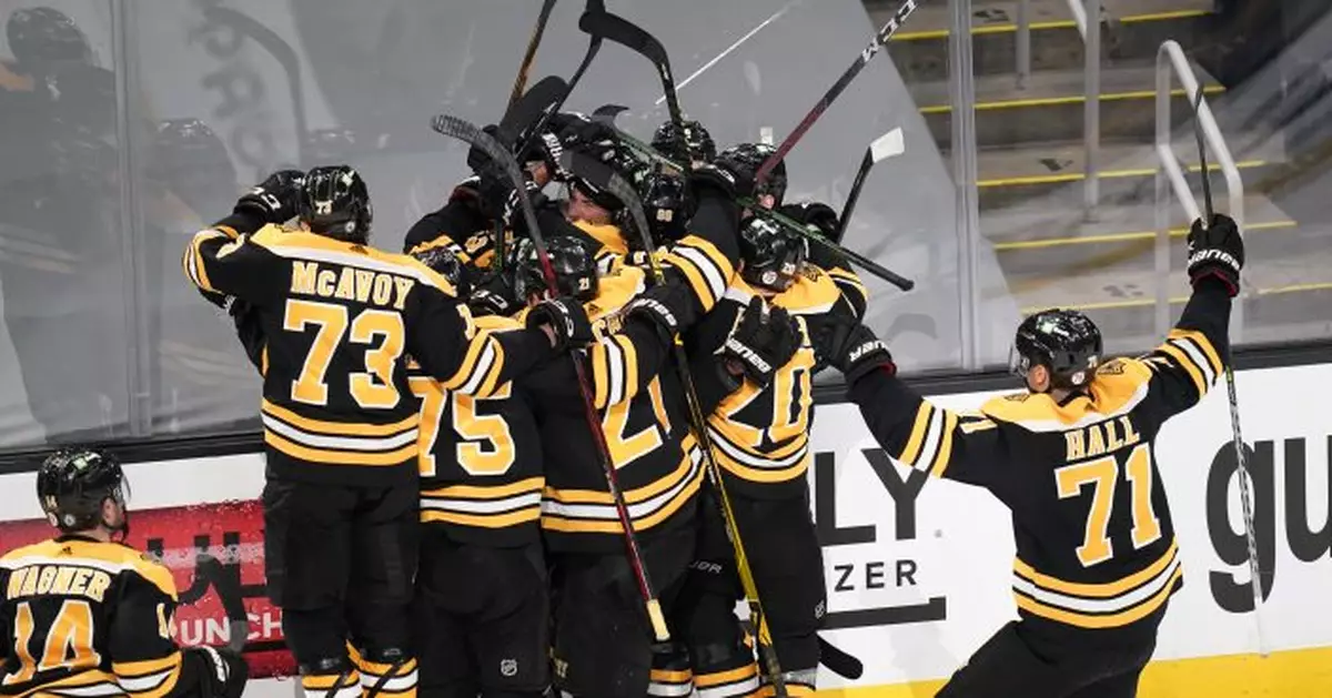 Smith scores in 2nd OT, Bruins beat Caps 3-2 for series lead