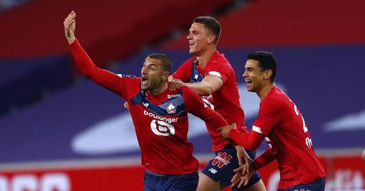 Yilmaz stars as Lille wins 3-0 to move 4 points ahead of PSG