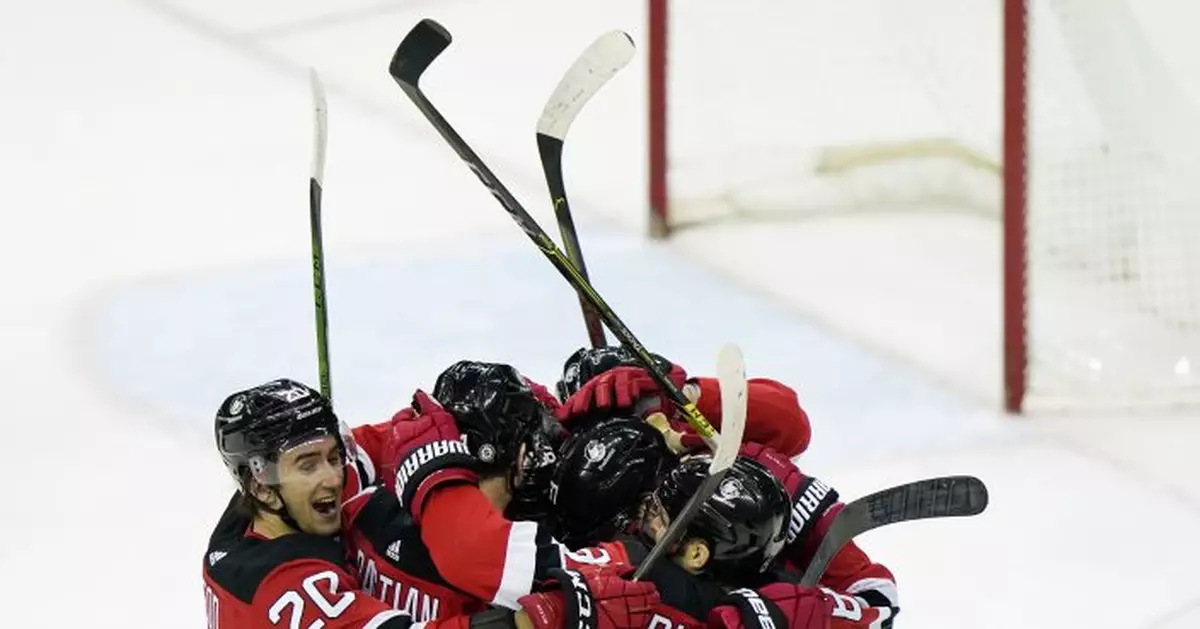 Devils slip past Bruins 4-3 OT win