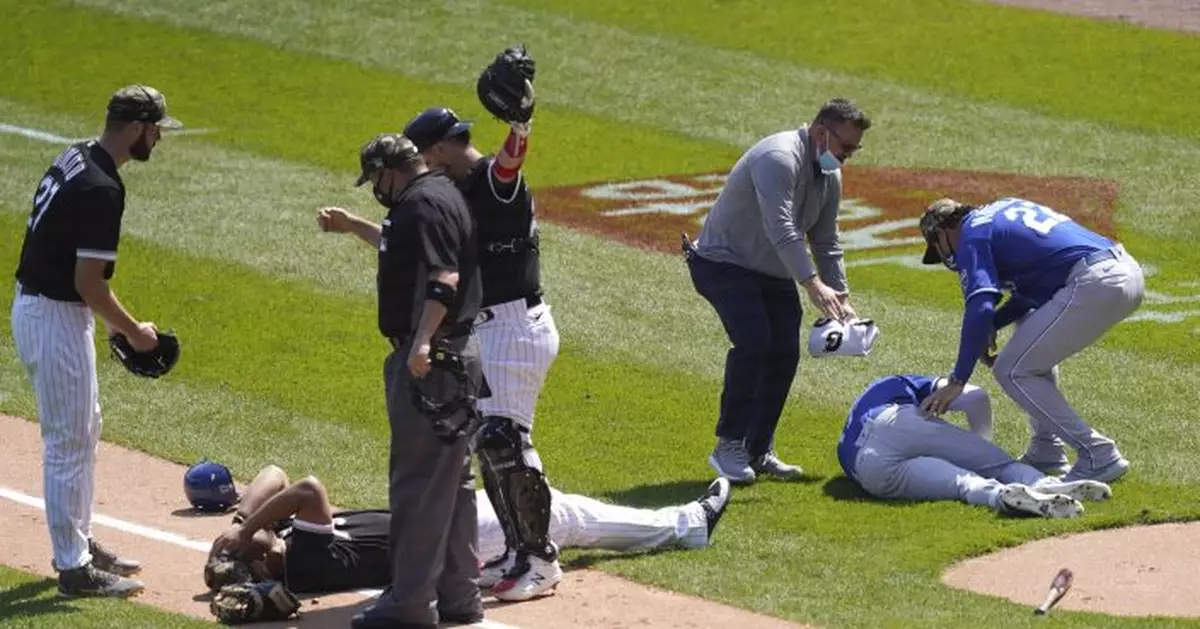 Abreu, Dozier hurt in collision, leave White Sox-Royals game