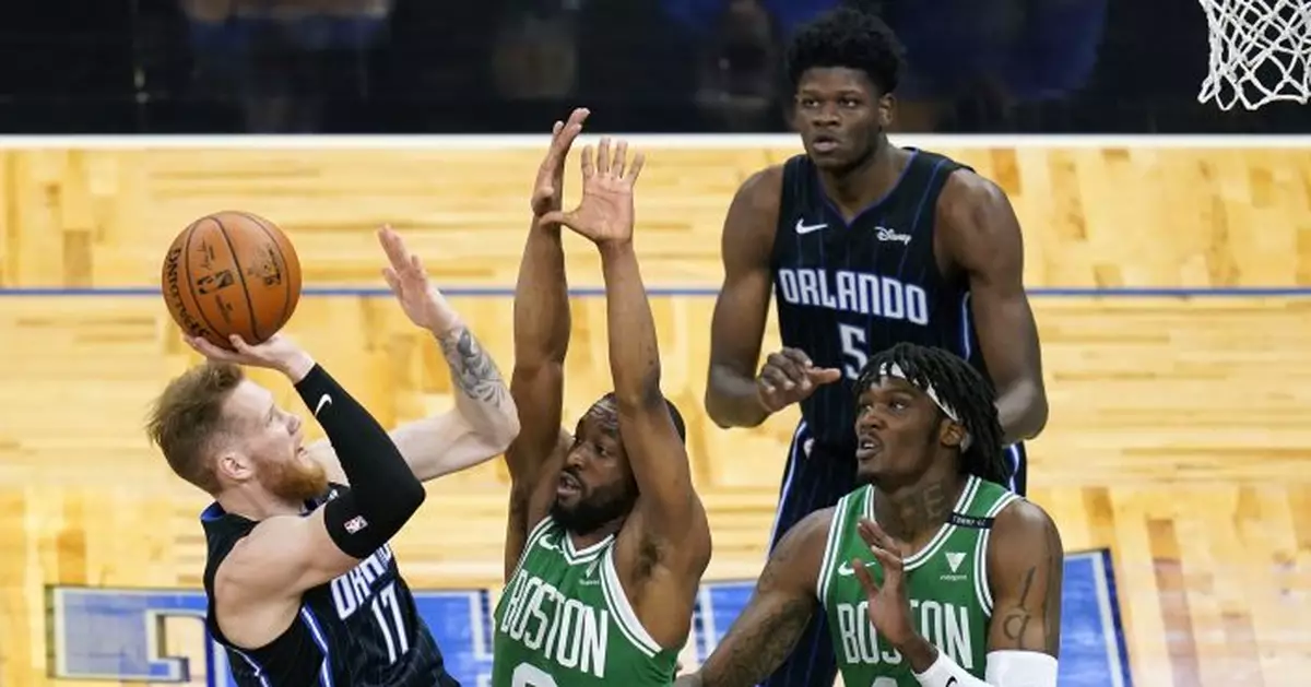Walker returns from injury, scores 32  as Celtics whip Magic