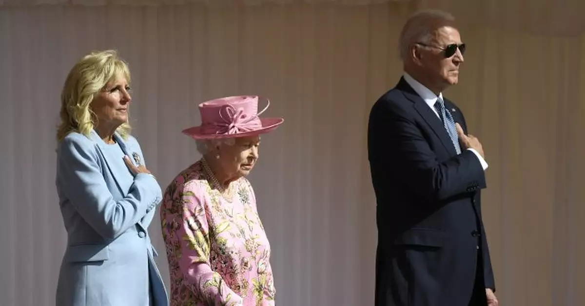 Biden and his aviators greet queen on a sunny afternoon