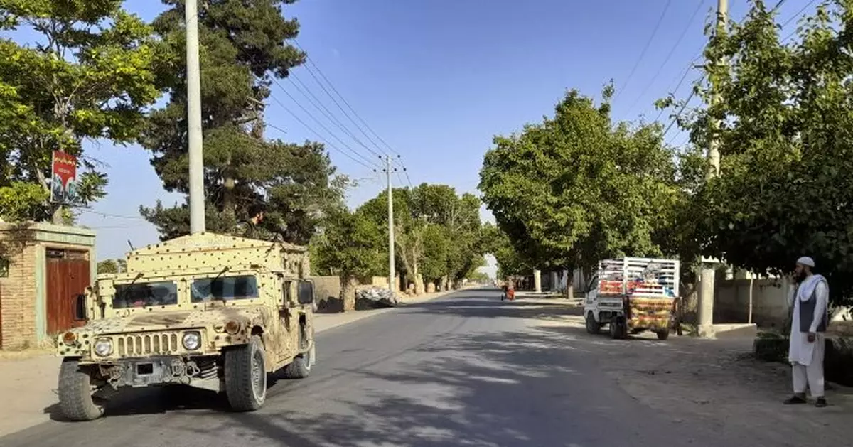 Taliban take key Afghan district, adding to string of wins
