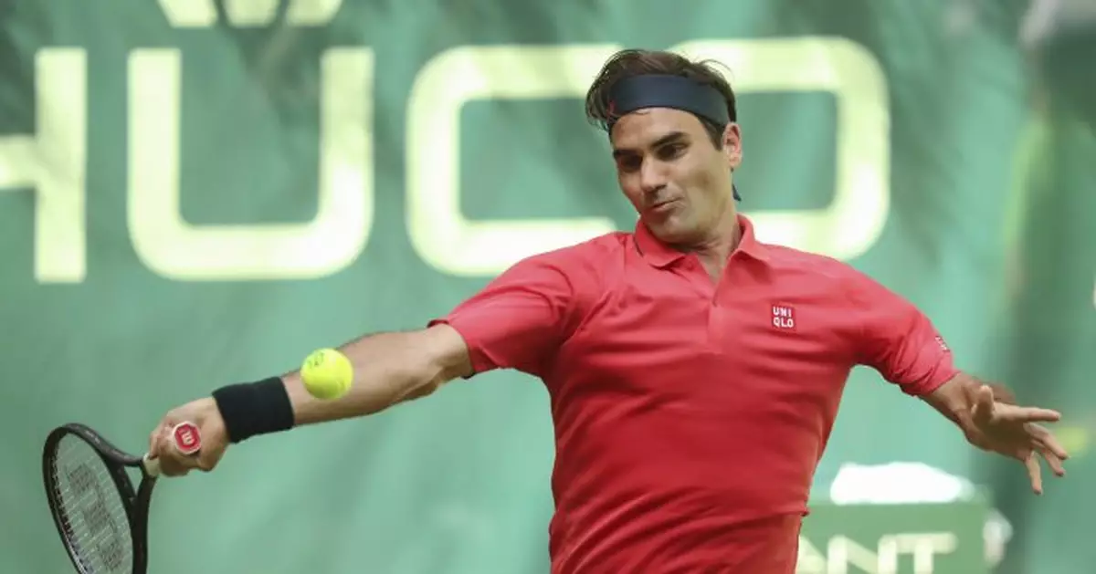 Roger Federer wins Halle opener on return to grass