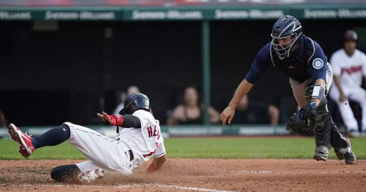 Indians rally in 9th, top Mariners on throwing error in 10th
