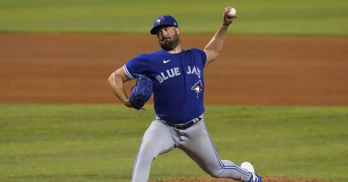 Ray helps Blue Jays win 4th straight by beating Marlins 3-1