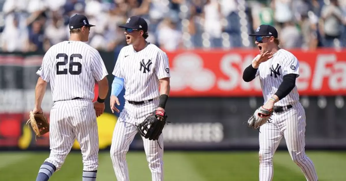 Yanks turn third triple play in month, beat A&#039;s 2-1