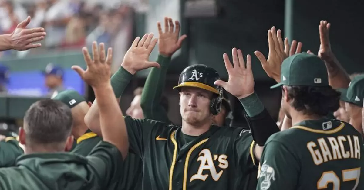 Athletics race to large, early lead, defeat Rangers 13-6