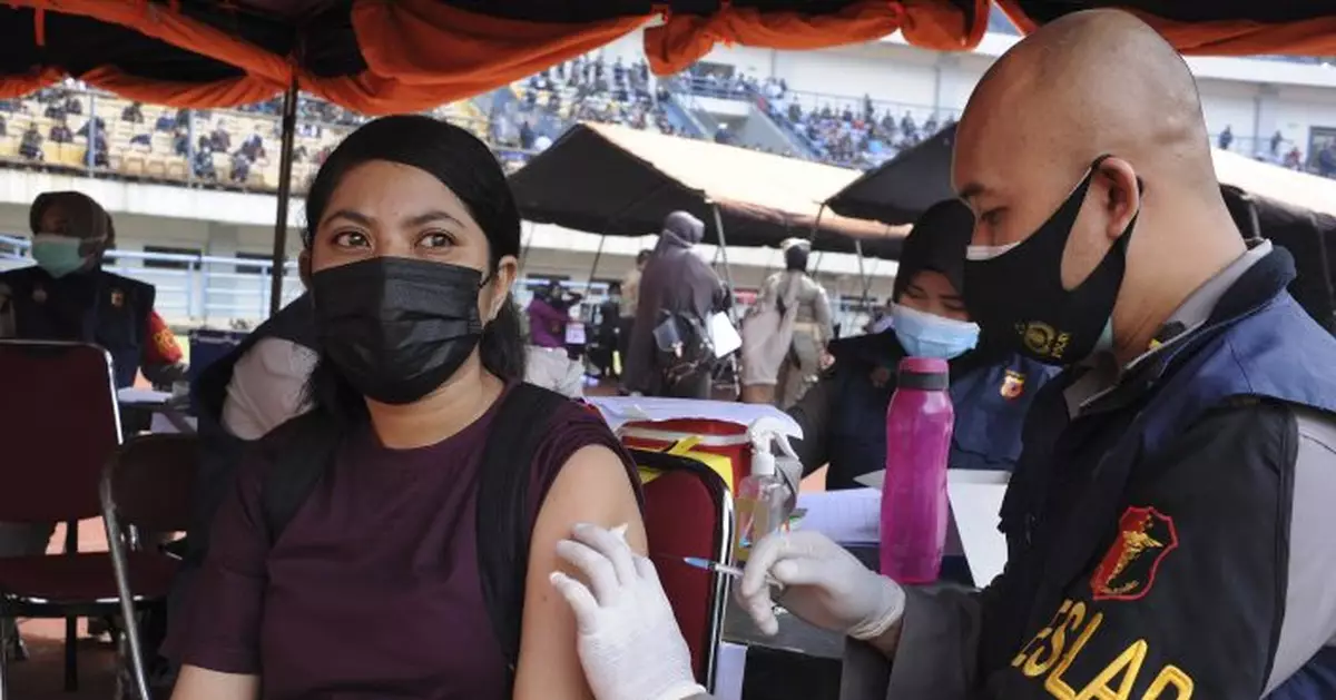 WHO warns of fresh Indonesia surge fed by virus variants