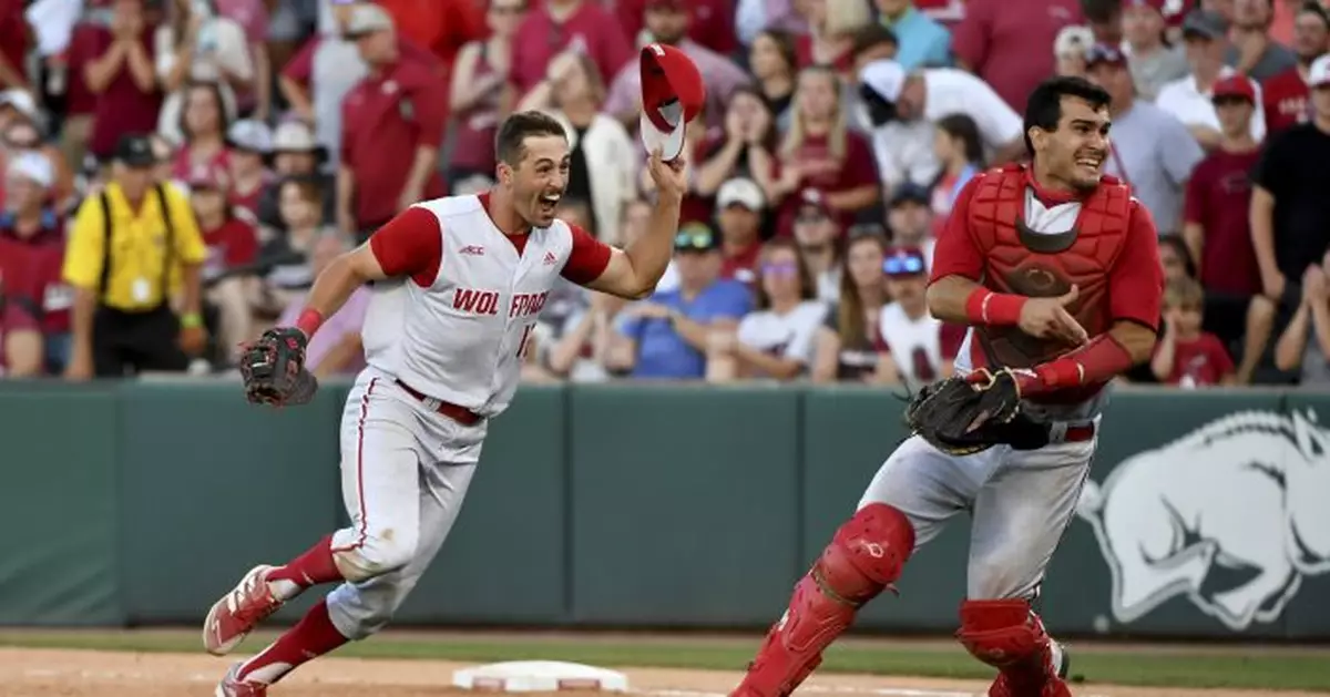 NC State knocks out No. 1 Arkansas on Torres&#039; homer in 9th