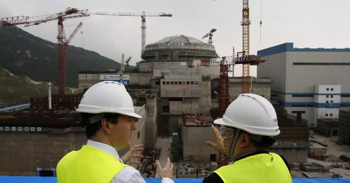 China says nuclear fuel rods damaged, no radiation leak