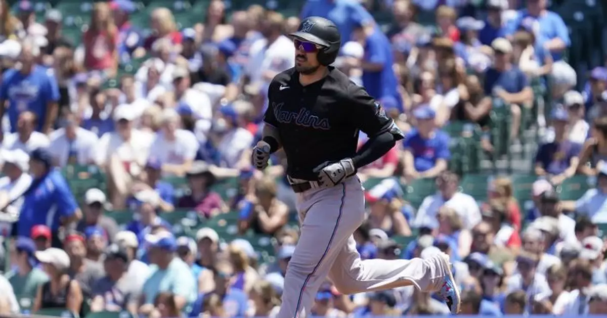 Duvall smacks 2 HRs again as Marlins pound Cubs 11-1