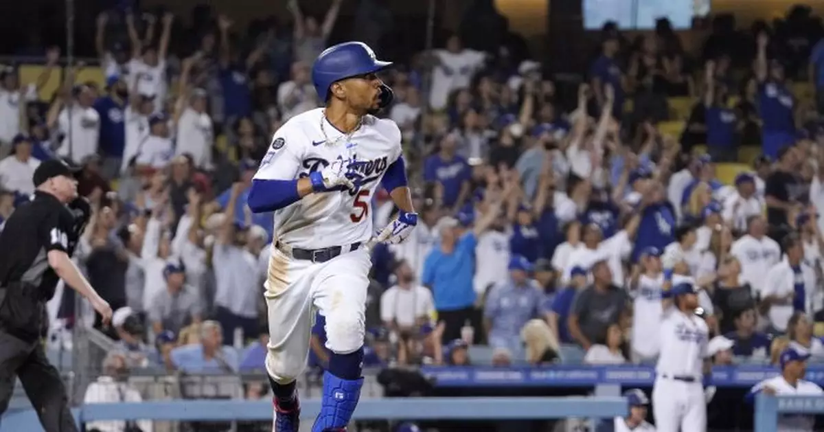 Betts homer in front of 52,078 leads Dodgers over Phillies
