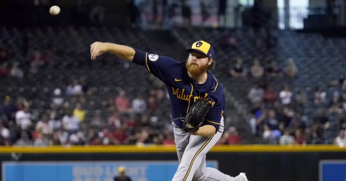Woodruff great on mound, adds big hit, Brewers beat D-backs