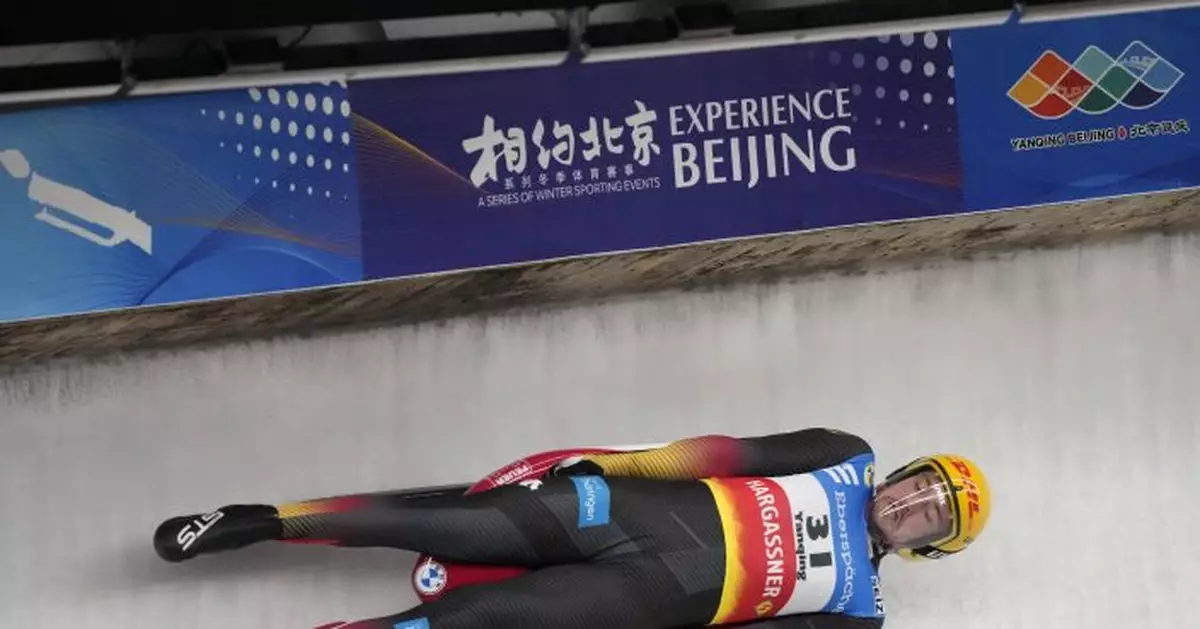 Ludwig wins odd World Cup luge race on a warm day in Russia