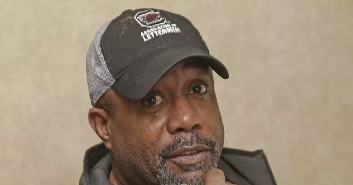 Darius Rucker knows teamwork critical in football and music