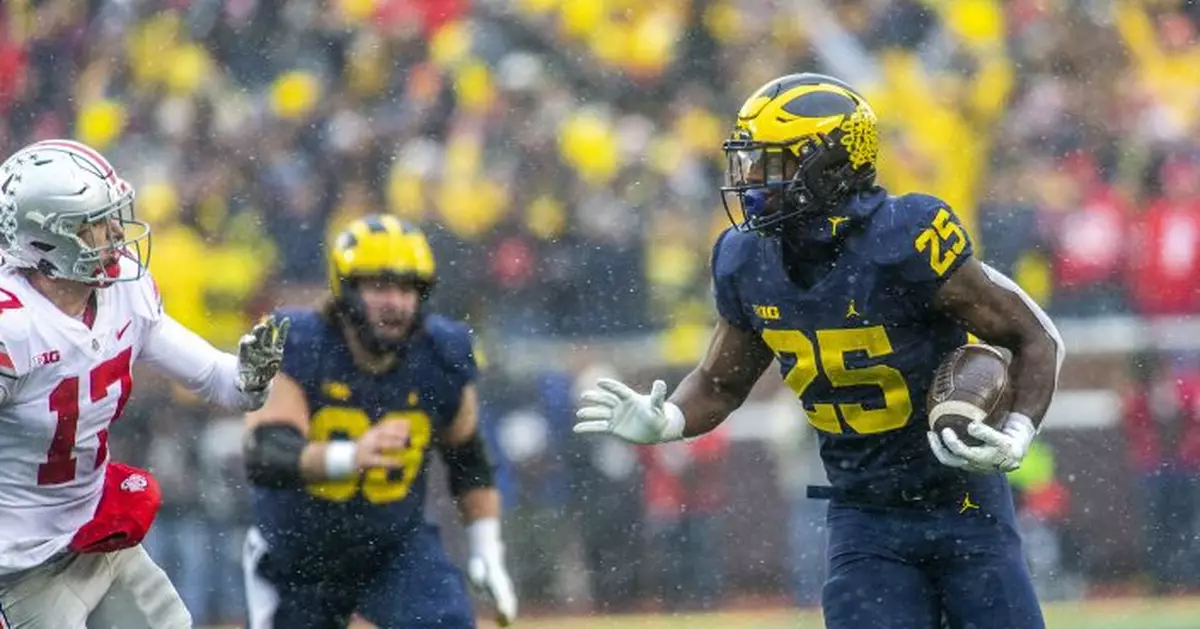 COLLEGE FOOTBALL TODAY: Michigan&#039;s Haskins scored 5 TDs