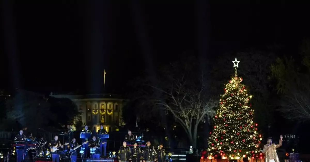 Biden helps light National Christmas Tree near White House