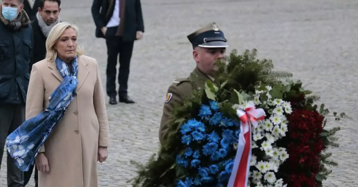 Le Pen honors Jewish, Polish victims of WWII in Warsaw
