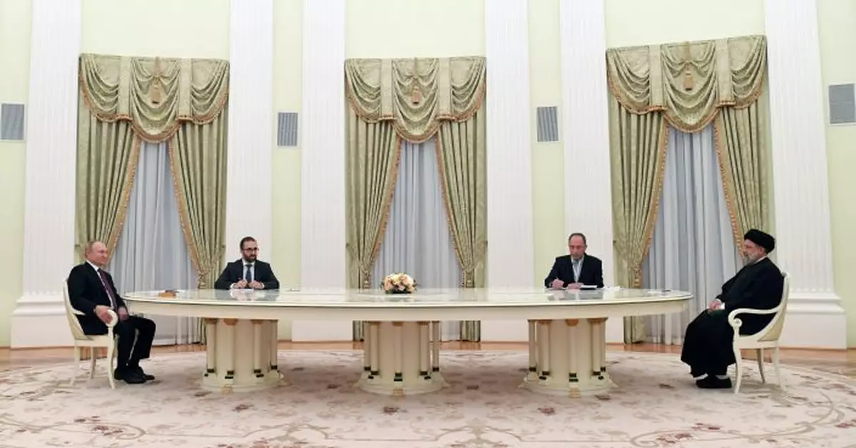 Putin hosts Iranian president for Kremlin talks