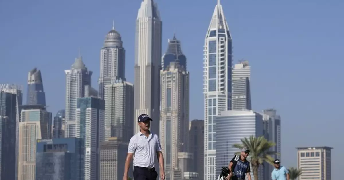 Harding birdies 18th hole twice, leads by 3 shots in Dubai